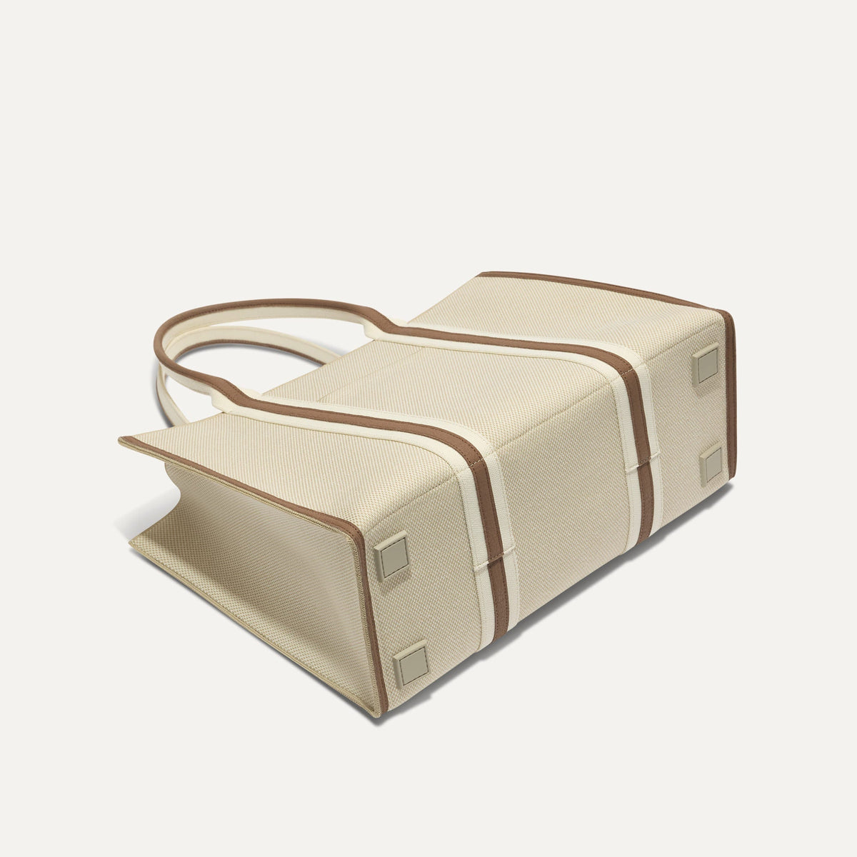 The Classic Tote in Buttercream, shown from the bottom.