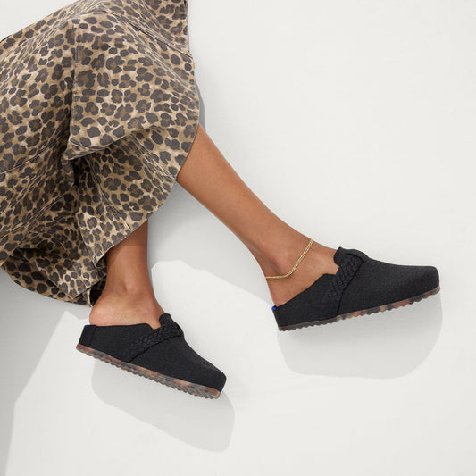 hover | Model wearing The Braid Clog in Black.