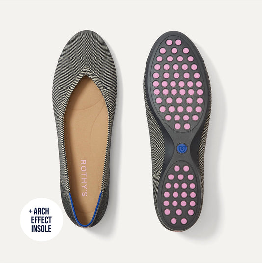 The Daily Flat in Salt Air shown from the top with one shoe showing the outsole.