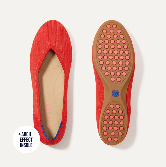 PDP |The Daily Flat in Showstopper Red shown from the top with one shoe showing the outsole.