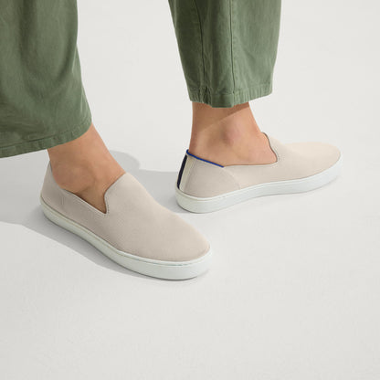 hover | The Original Slip On Sneaker in Sand shown on a model.