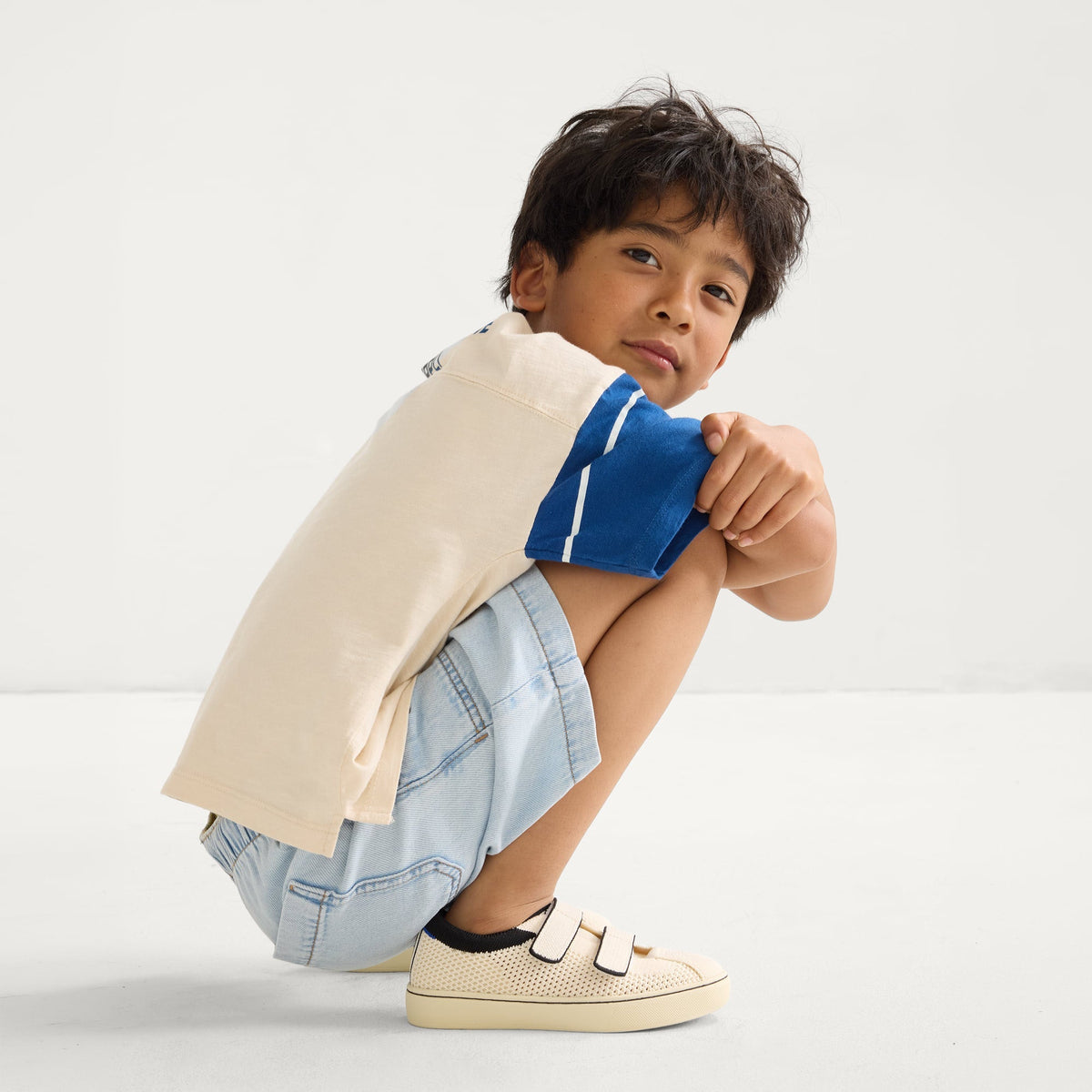 model | Alternate image of a boy modeling The Kids Strap Sneaker in Chess Open-Knit.