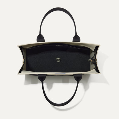 The Classic Tote in Luna, shown from above, with the interior exposed.