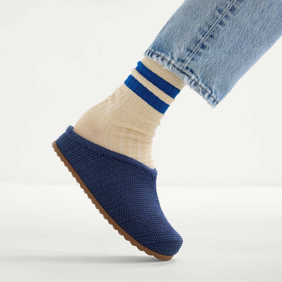 Hover | Model wearing The Casual Clog in Toffee Raffia-Knit.