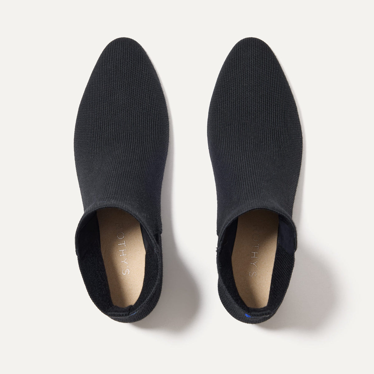 A pair of The Classic Boot in Black shown from the top.