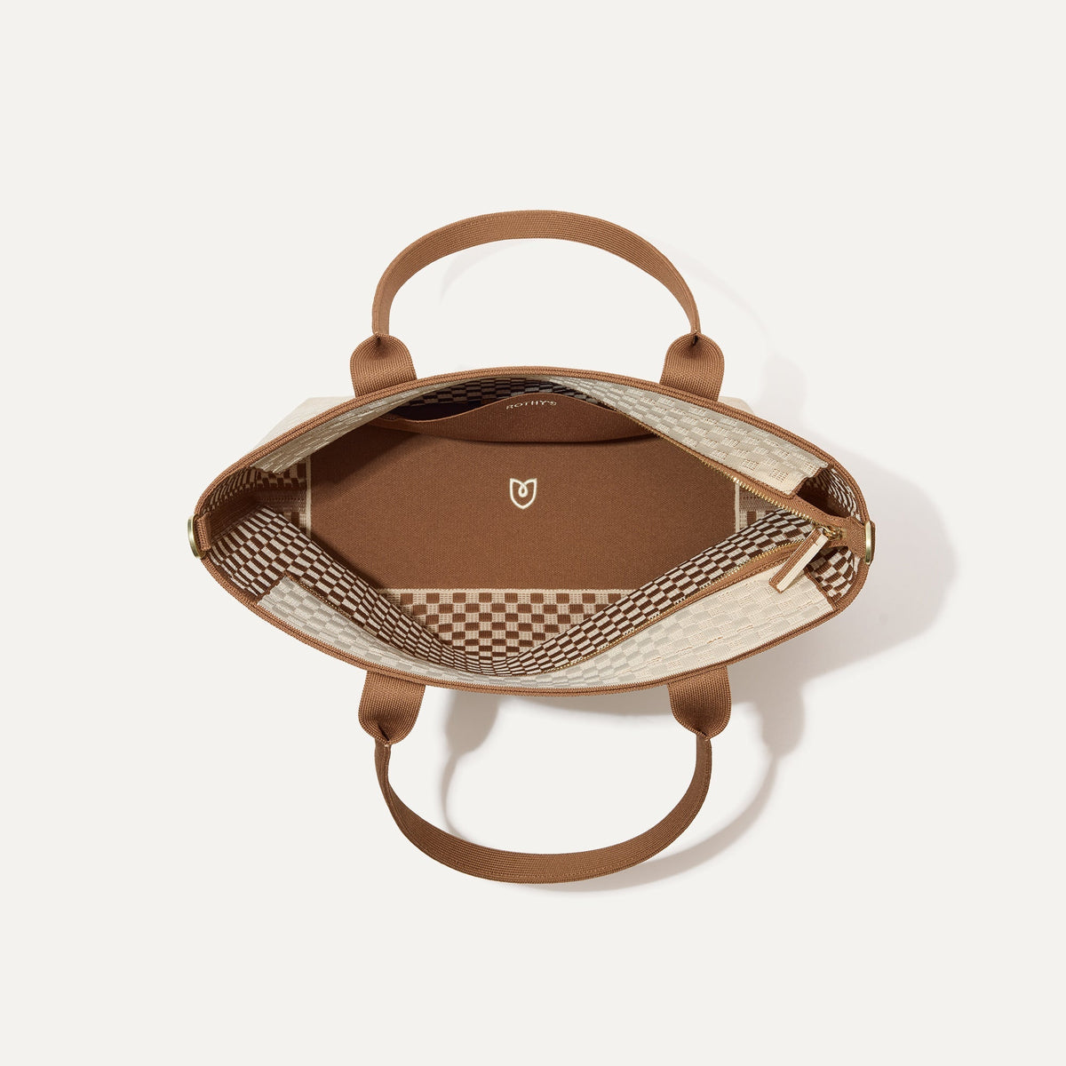 The Lightweight Zip Tote, shown from above with the interior exposed.