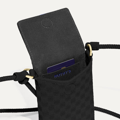 Close up of The Phone Crossbody interior slip pocket.