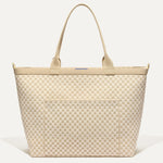 PLP |The Zip Travel Tote in Parchment Basketweave shown from the front.