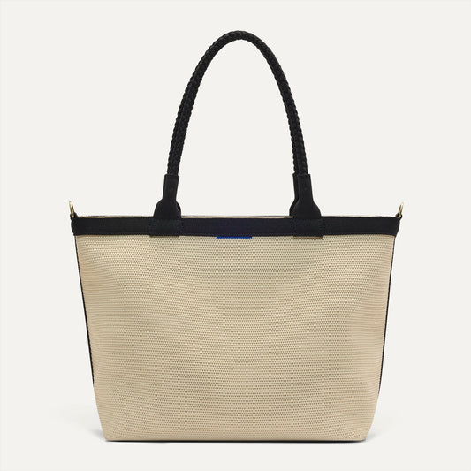 PDP |The Lightweight Zip Tote in Black and White Raffia-Knit shown from the front.