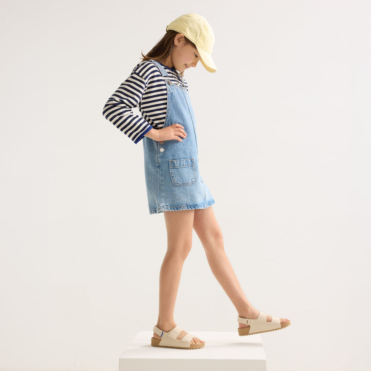 model | Alternate view of a girl wearing The Kids Double Strap Sandal in Conch.