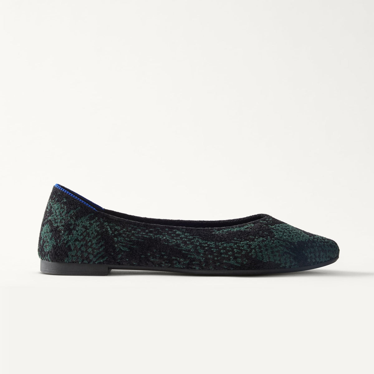 side | The Point III in ReVelvet Evergreen Python shown from the side.