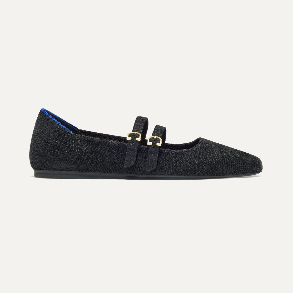 side | The Double Buckle Mary Jane in ReVelvet™ Black shown from the side.