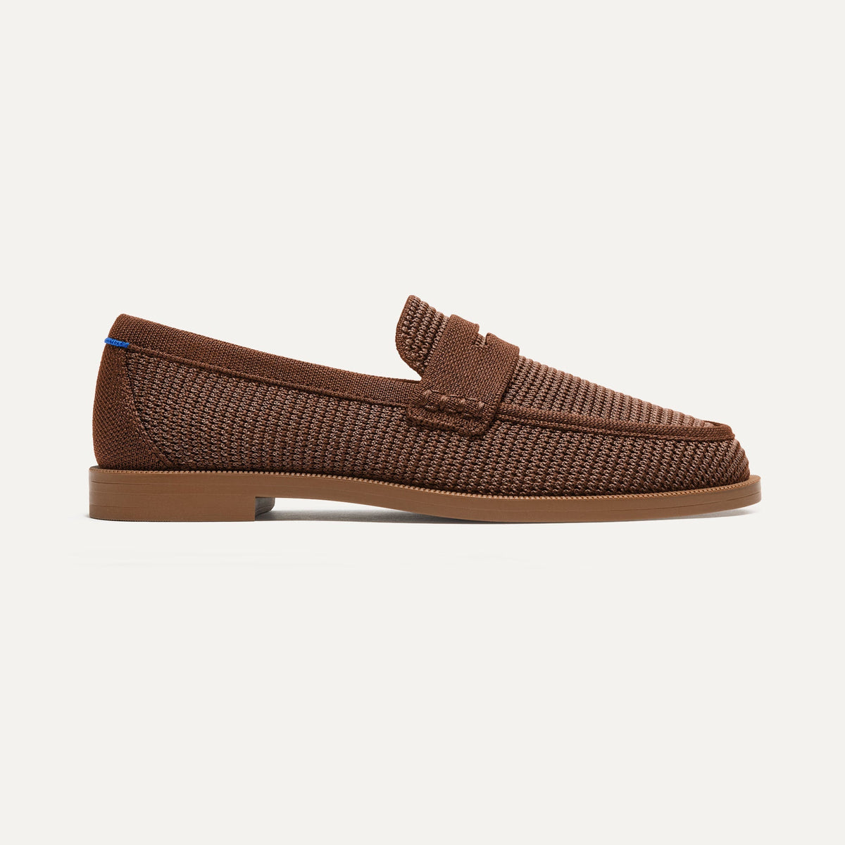 side | The Penny Loafer in Cinnamon Raffia-Knit shown from the side.
