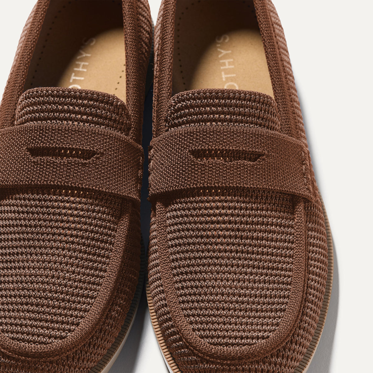 Close up of the toe box and penny keeper of The Penny Loafer in Cinnamon Raffia-Knit.