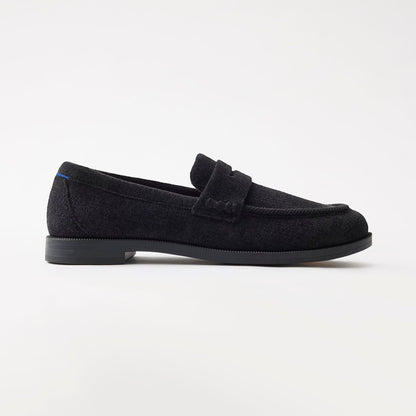 side | The Penny Loafer in ReVelvet Black shown from the side.