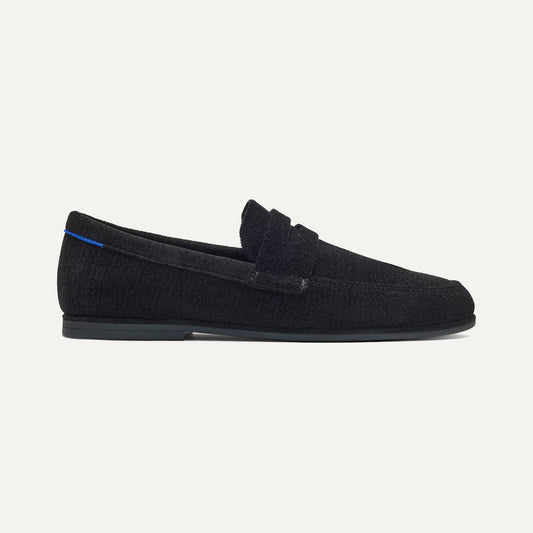 side | The Ravello Penny Loafer in ReVelvet™ Black shown from the side.