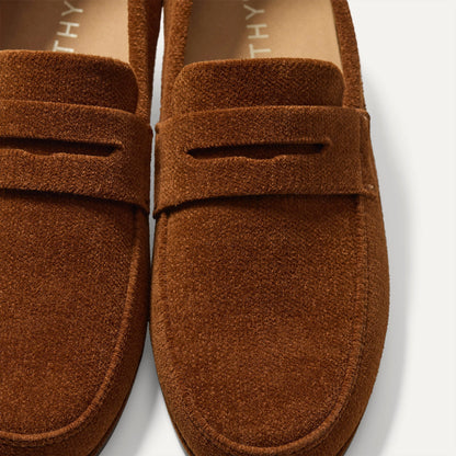 Close up of the vamp and penny keeper detail on The Ravello Penny Loafer in Russet.