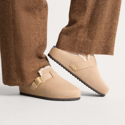hover | Model wearing The Teddy Buckle Clog in Honey.