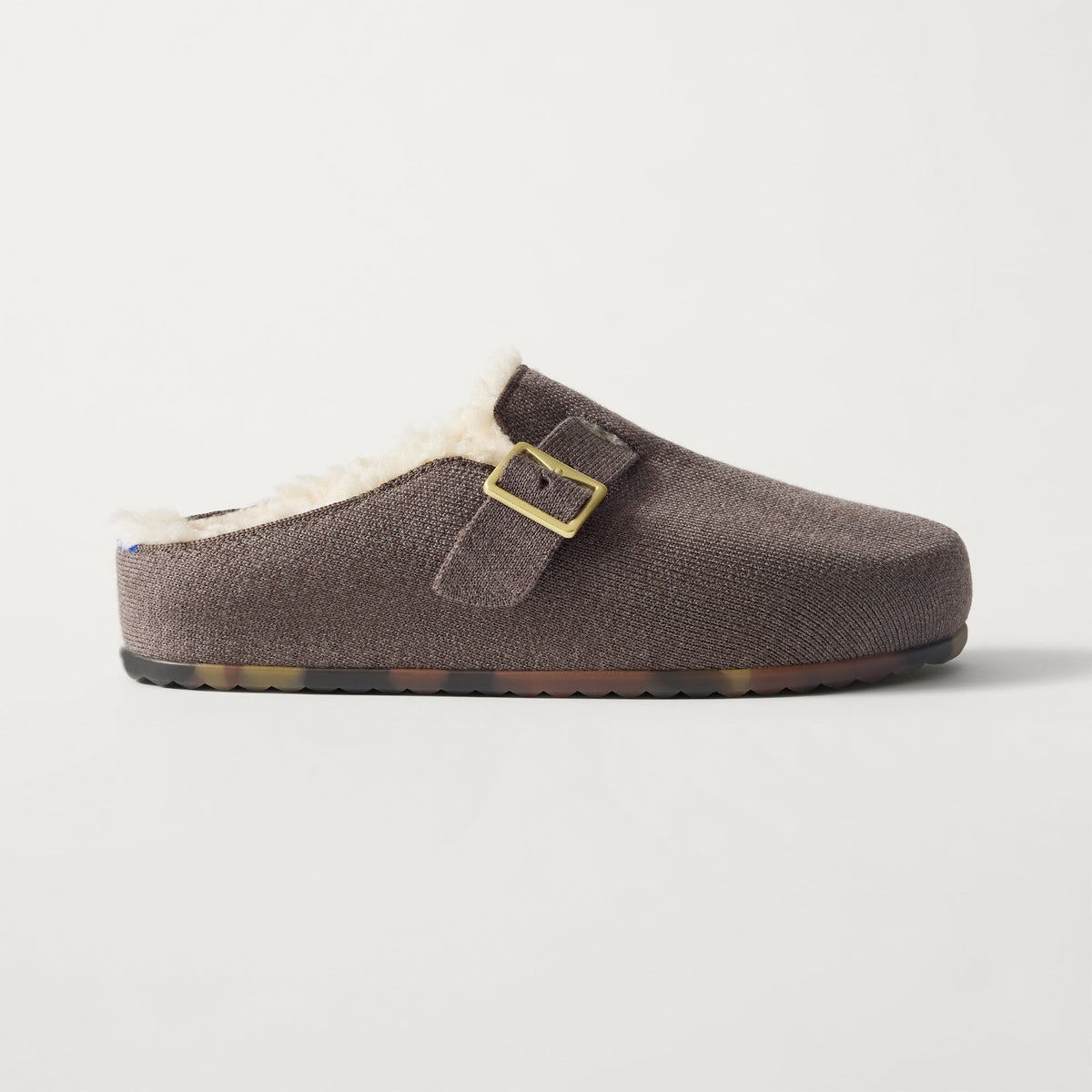 side | The Teddy Buckle Clog in Porcini shown from the side.