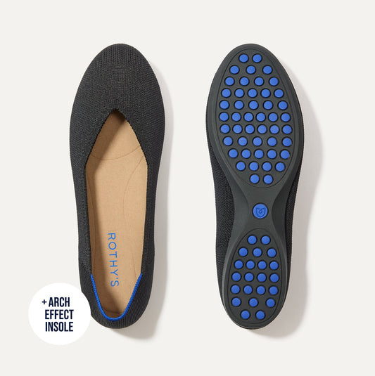 PDP |The Daily Flat in Black shown from the top with one shoe showing the outsole.