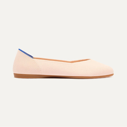 side | The Daily Flat in Bubbly Pink shown from the side.