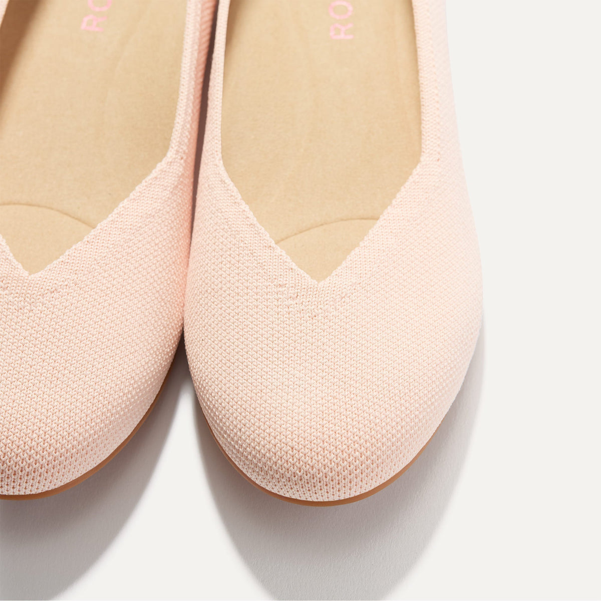 Close up of the toe and vamp of The Daily Flat in Bubbly Pink.