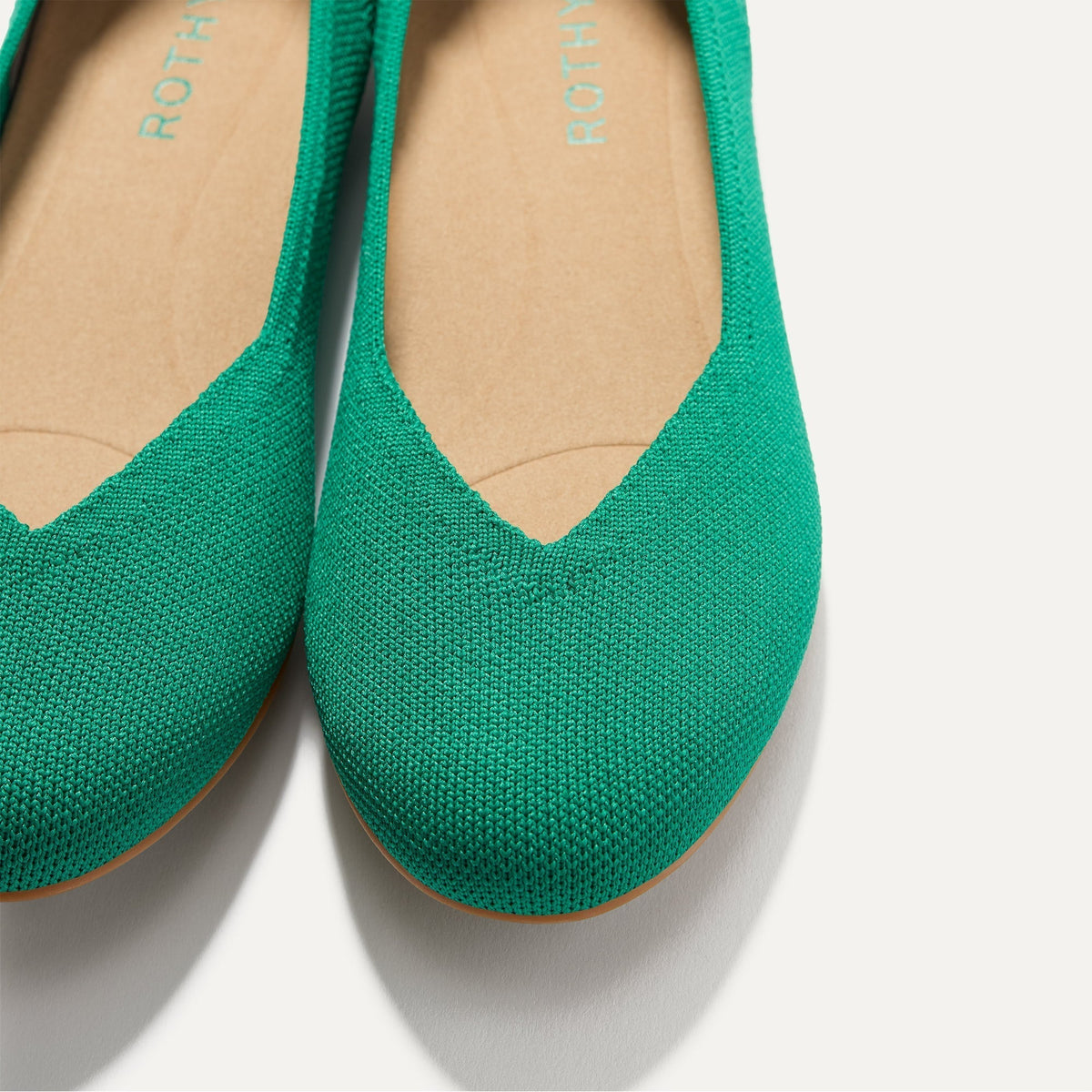 Close up of the toe and vamp of The Daily Flat in Clover.
