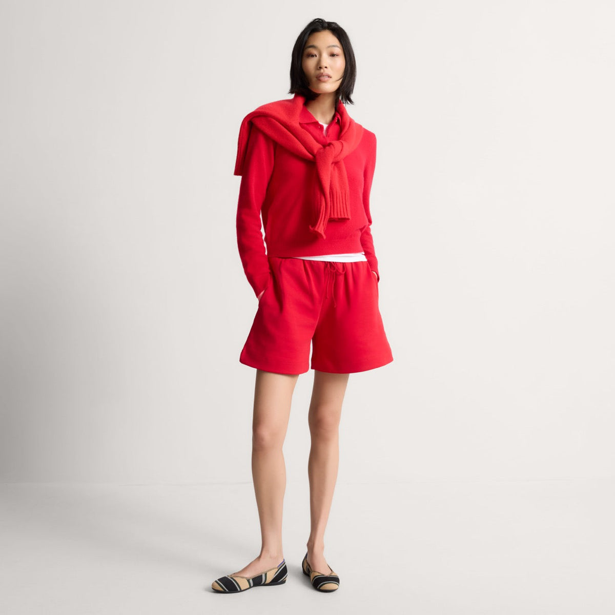 Alternate view of a model wearing The Daily Flat in Hickory Stripe.