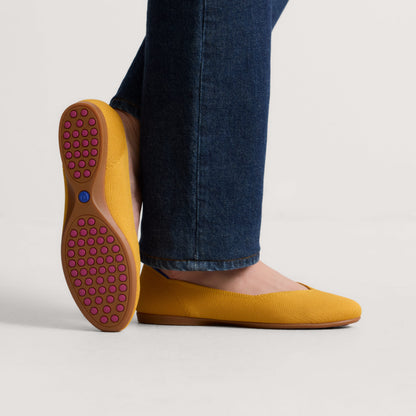 hover | Model wearing The Daily Flat in Marigold.