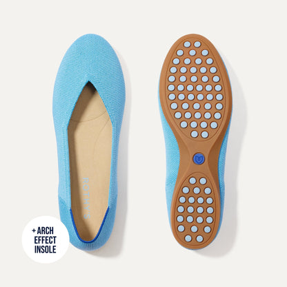 PDP |The Daily Flat in Robin Blue shown from the top with one shoe showing the outsole.