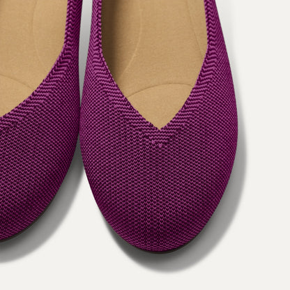 Close up of the toe and vamp of The Daily Flat in Wild Berry.