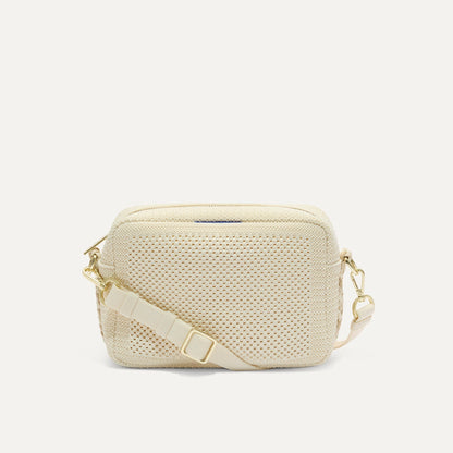 PLP |The Crossbody Camera Bag in Cream Twist Open-Knit, shown from the front.