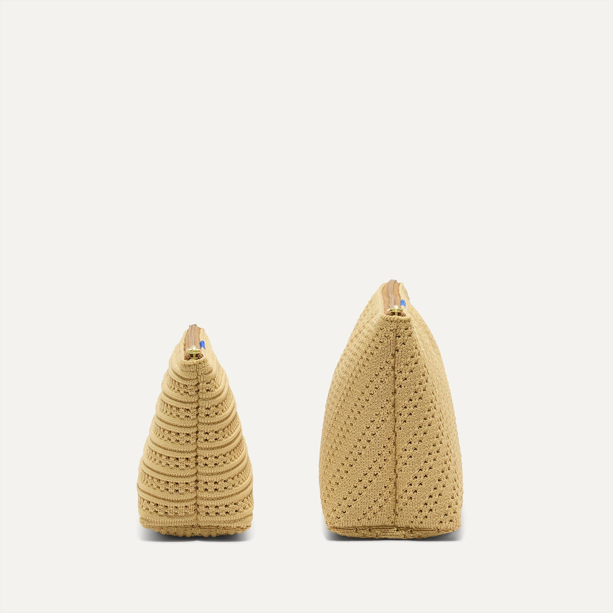 The small pouch of The Travel Pouch Set in Brown Butter Crochet shown in diagonal view.
