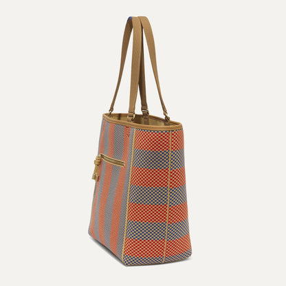 The Two-Way Tote in Sienna, shown from the side.