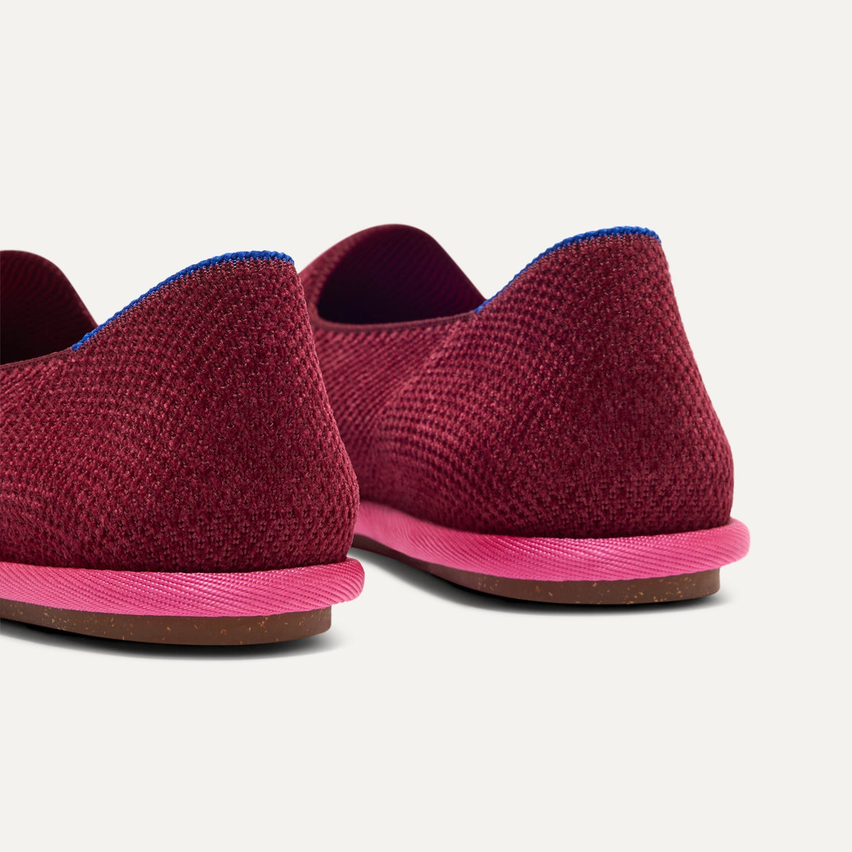 Close up of the heel of The Cruiser Loafer in ReVelvet™ Cabernet, with Rothy's signature blue halo.