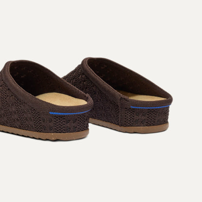 Close up of the heel of The Casual Clog in Chocolate Crochet, with Rothy's signature blue halo.