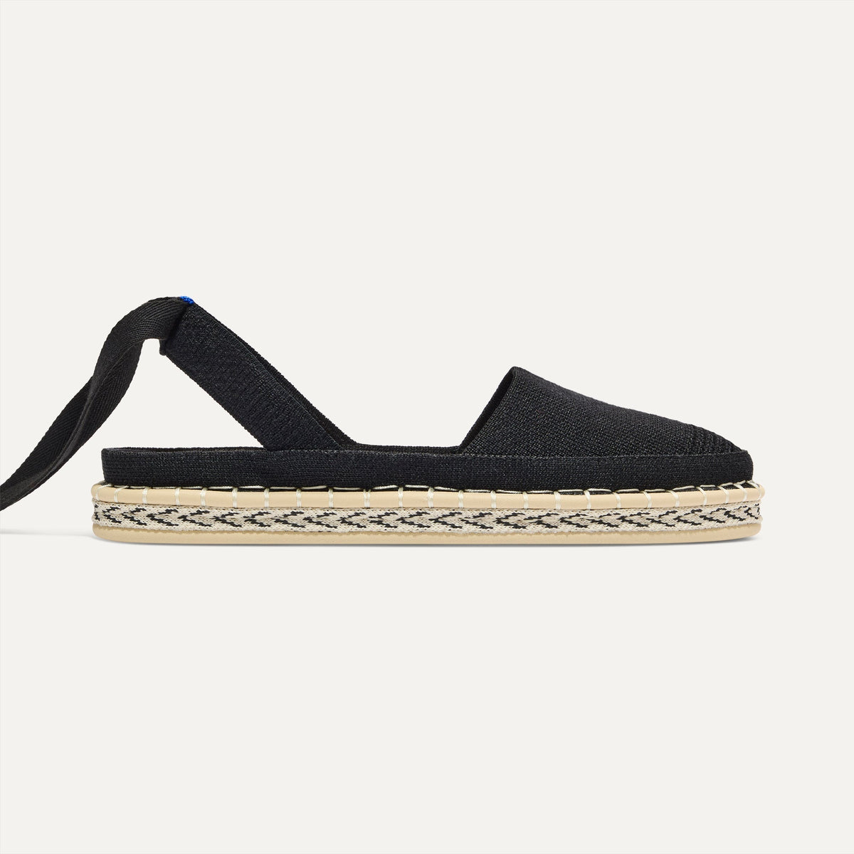 side | The D'Orsay Espadrille in Black, shown from the side.