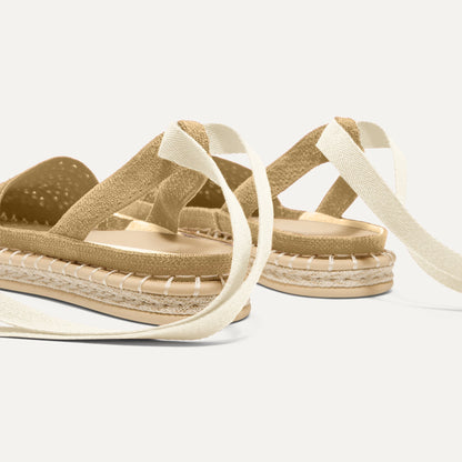 Close up of the heel of The D'Orsay Espadrille in Camel Crochet, showing removable ankle straps.