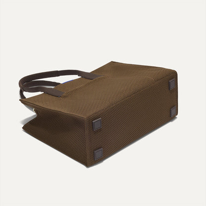 The Classic Tote in Cinnamon Open Knit, shown from the bottom.