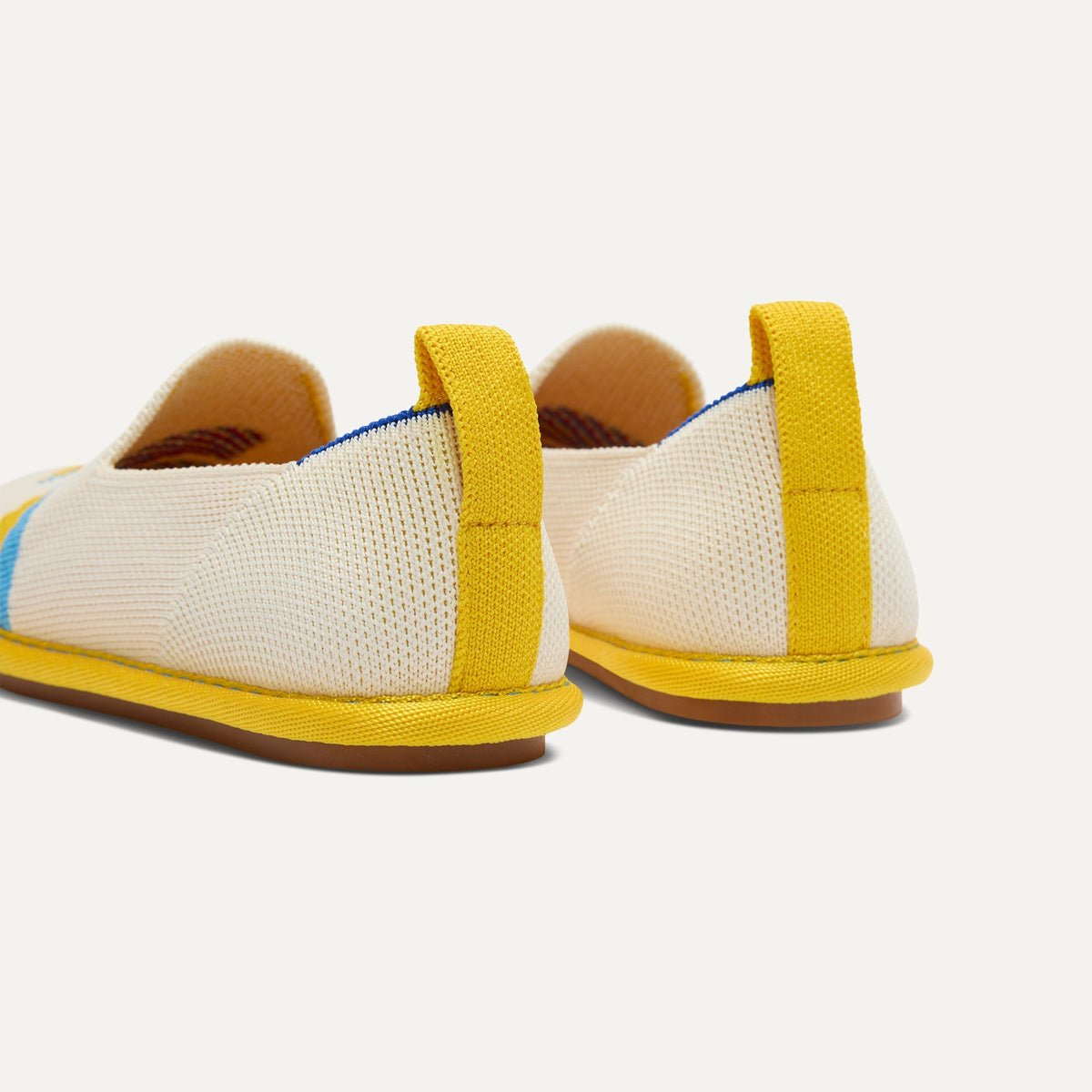 The Mini Loafer in Silly Sardine shown from the back view with the heel detail.
