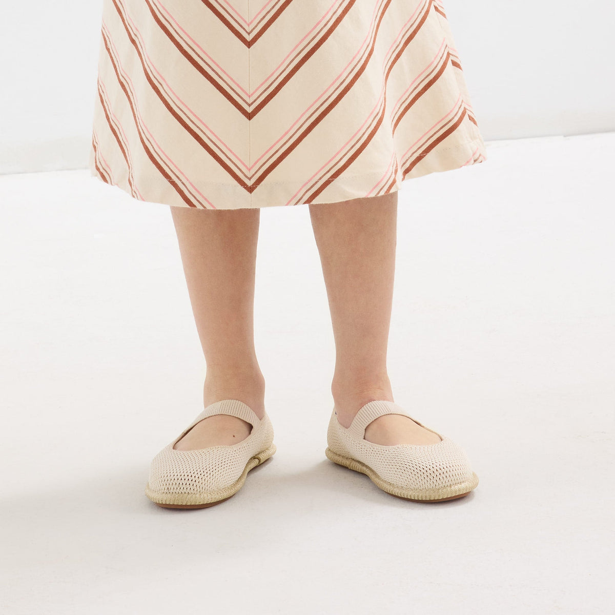 hover | A model wearing The Mini Mary Jane in Opal Raffia-Knit.