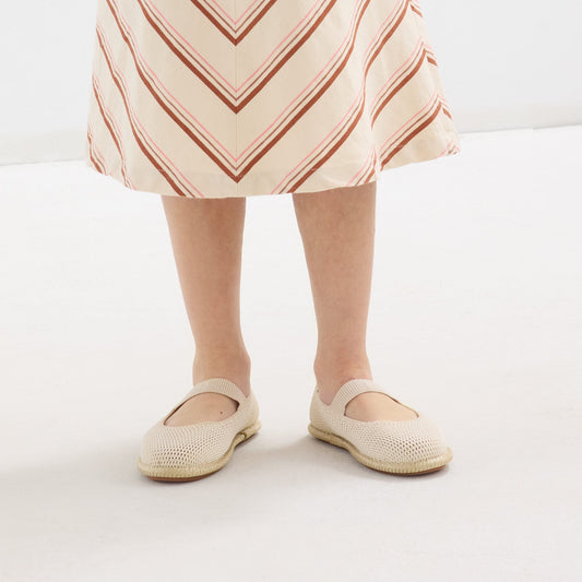 hover | A model wearing The Mini Mary Jane in Opal Raffia-Knit.