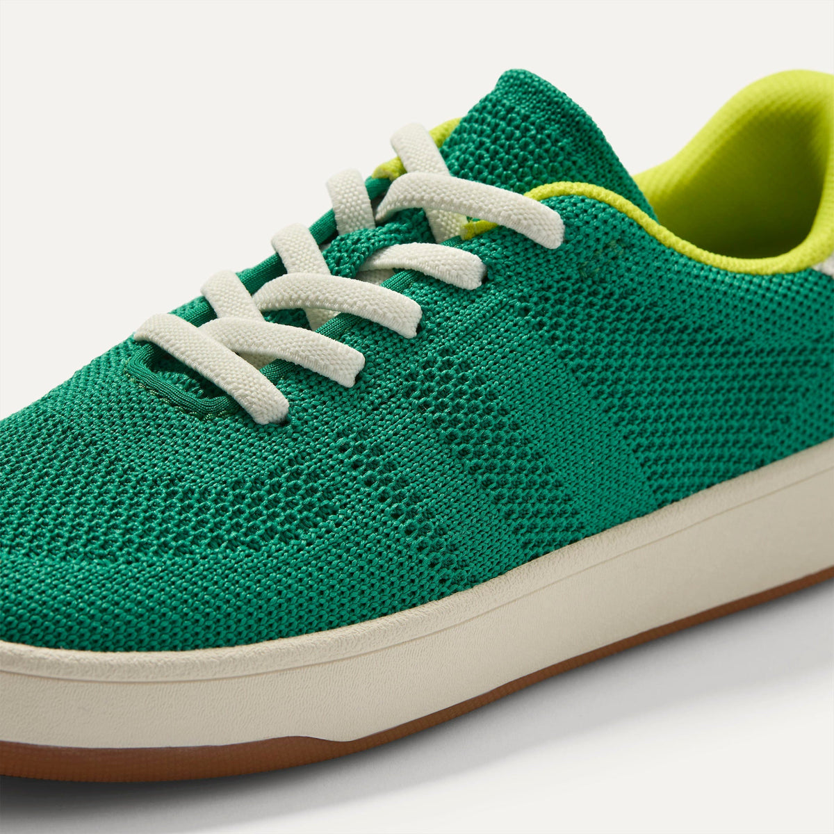 Overlay::Stretchy, No-Tie Laces | Alt::Close up of the vamp and laces of The Kids Stretch Sneaker in Emerald Pop.