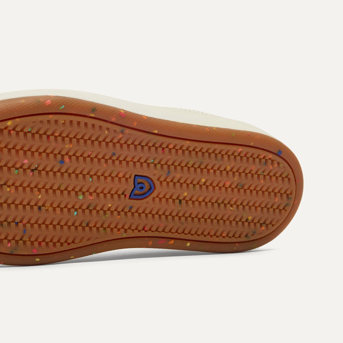 The sole of The Kids Stretch Sneaker in Turbo.