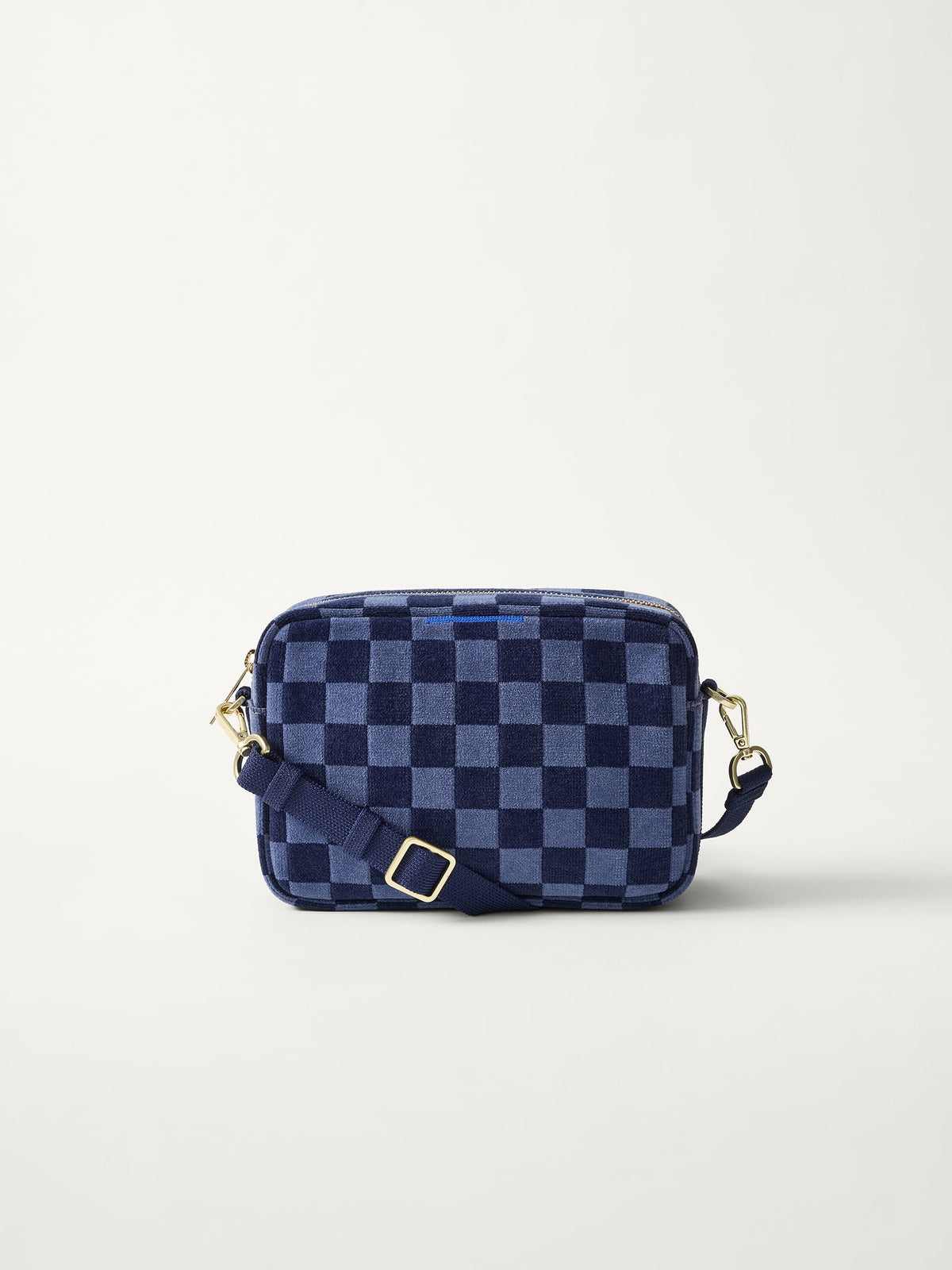 PLP | The Crossbody Camera Bag in ReVelvet™ Blue Ink, shown from the front.